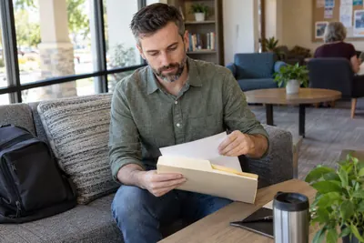 A person preparing for a local office visit