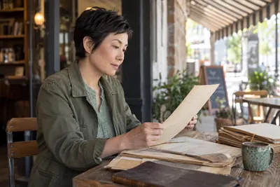 A researcher reviewing historical company documents